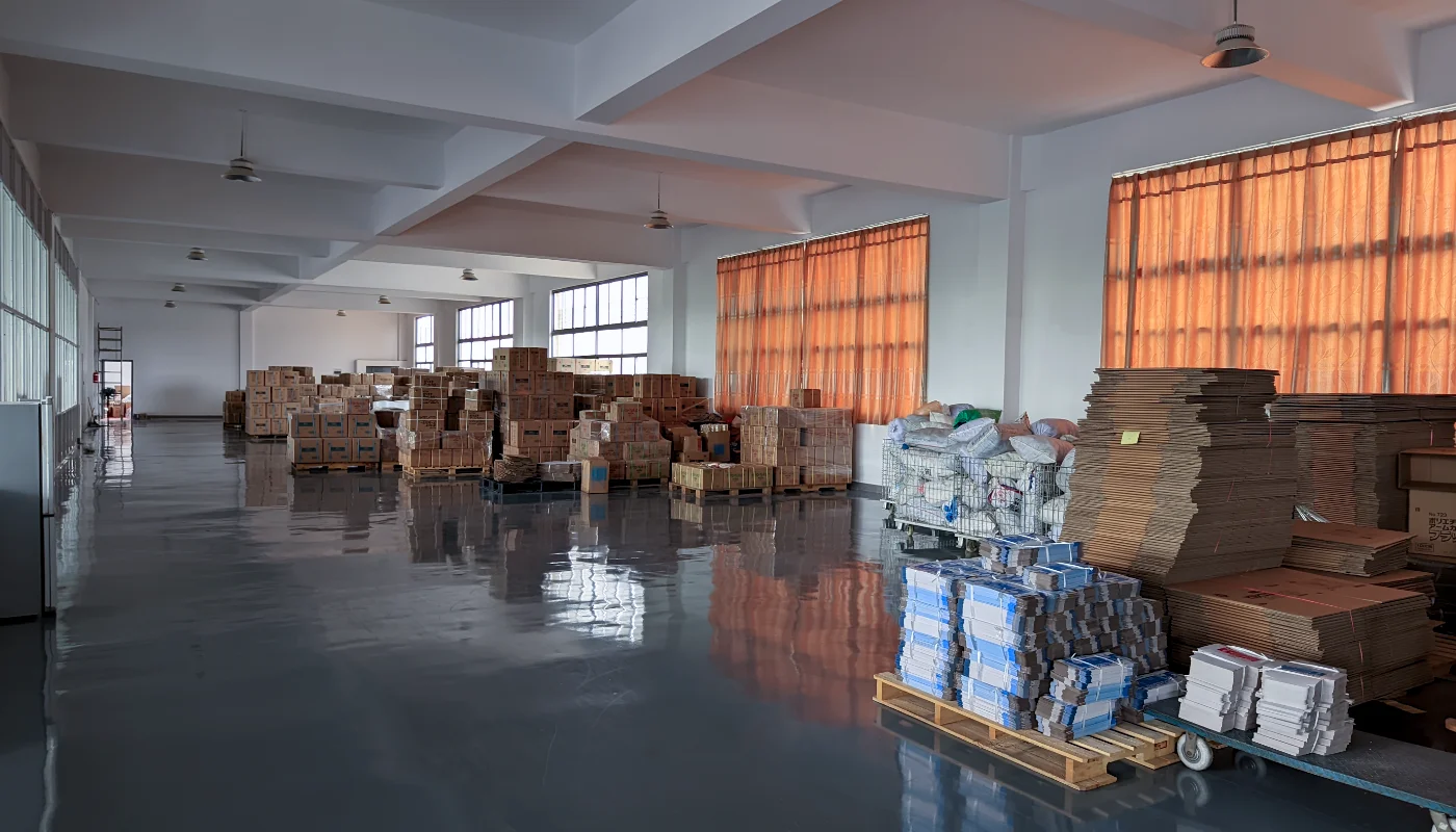 Spacious warehouse with boxes and orange curtains